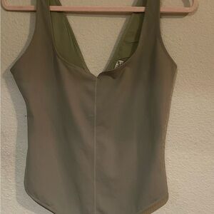 NWOT INTIMATELY FREE PEOPLE OLIVE GREEN BODY SUITE  SIZE MEDIUM.